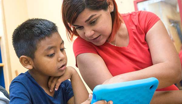 parent reviewing lesson with child